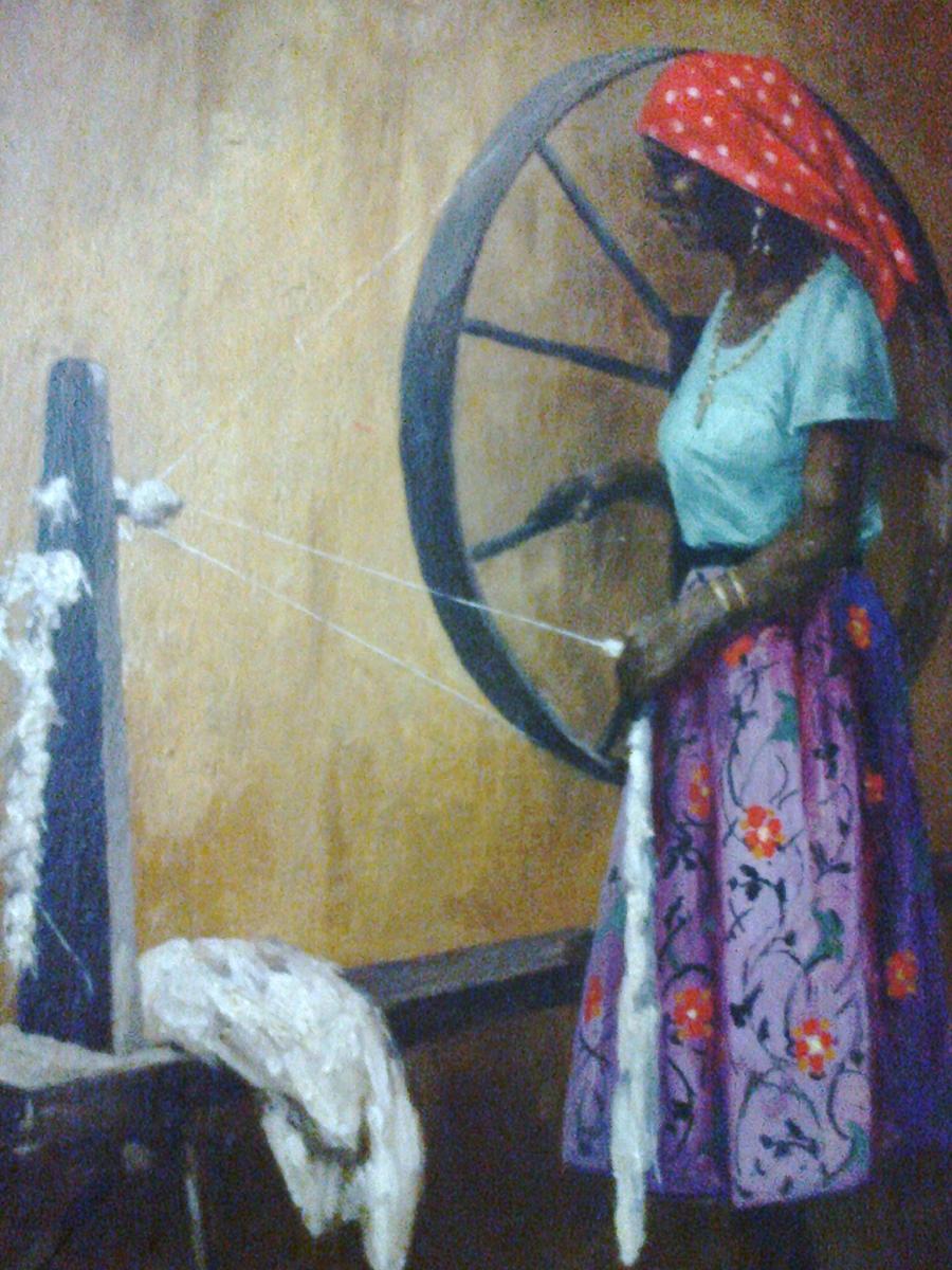 Mulher roda de fiar